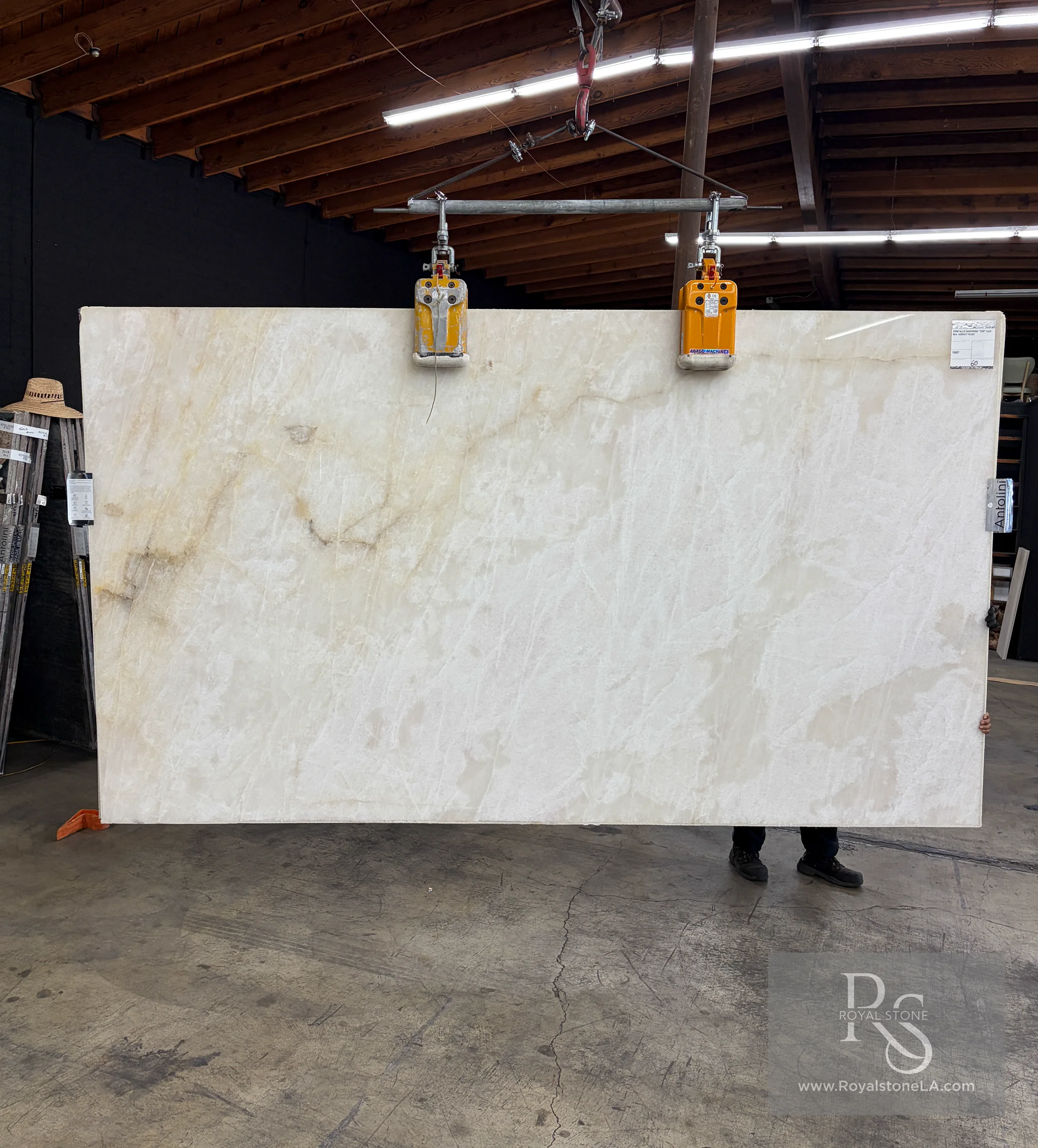 Antolini Cristallo Babyrose Gold Top YG627 polished quartzite slab, 78 by 136 inches, selected for Pacific Palisades fire rebuild homes and photographed at Royal Stone Los Angeles