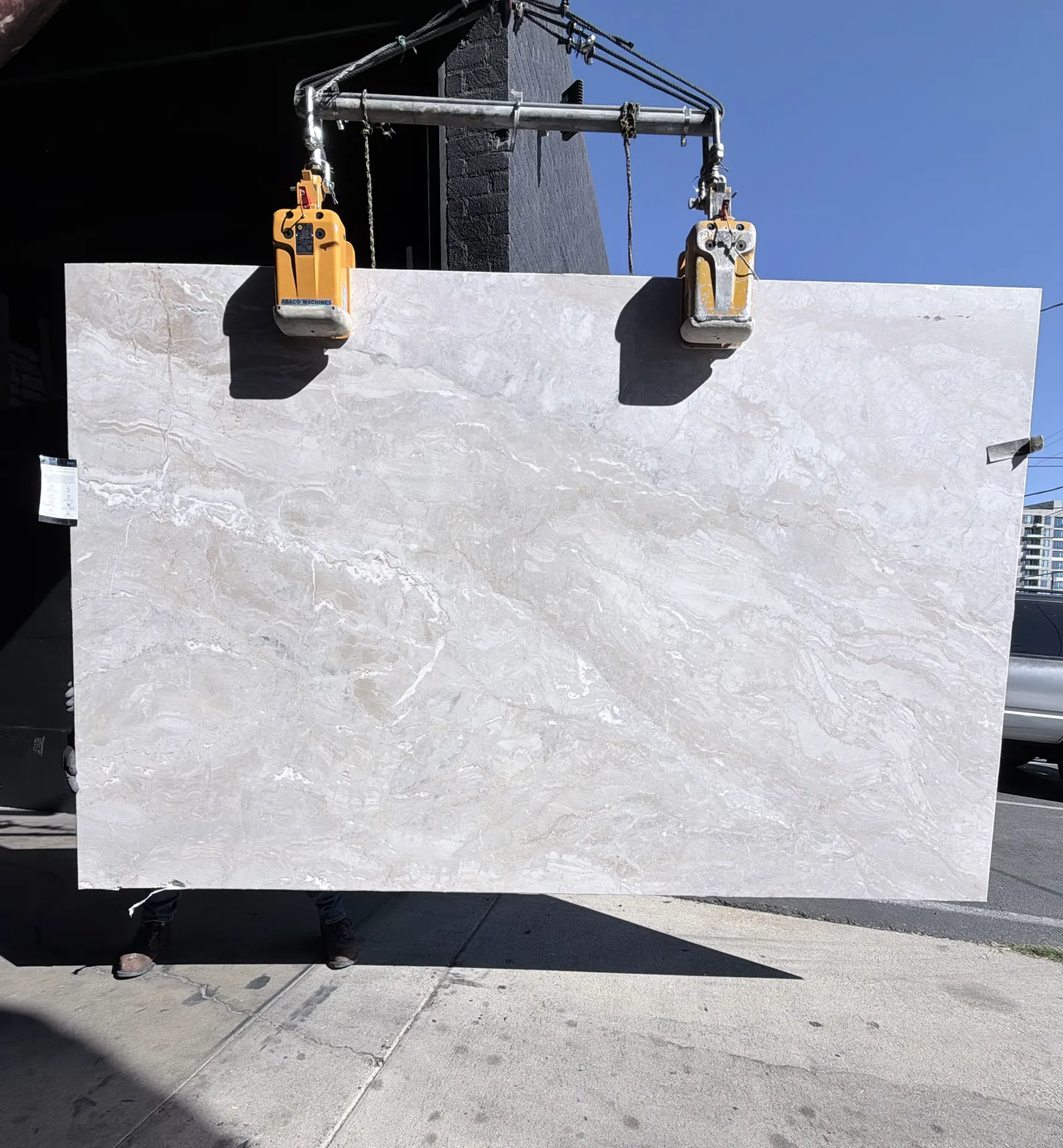 Antolini Dolce Vita EF531 honed marble slab suspended outdoors at the Royal Stone yard, 76 by 117 inches