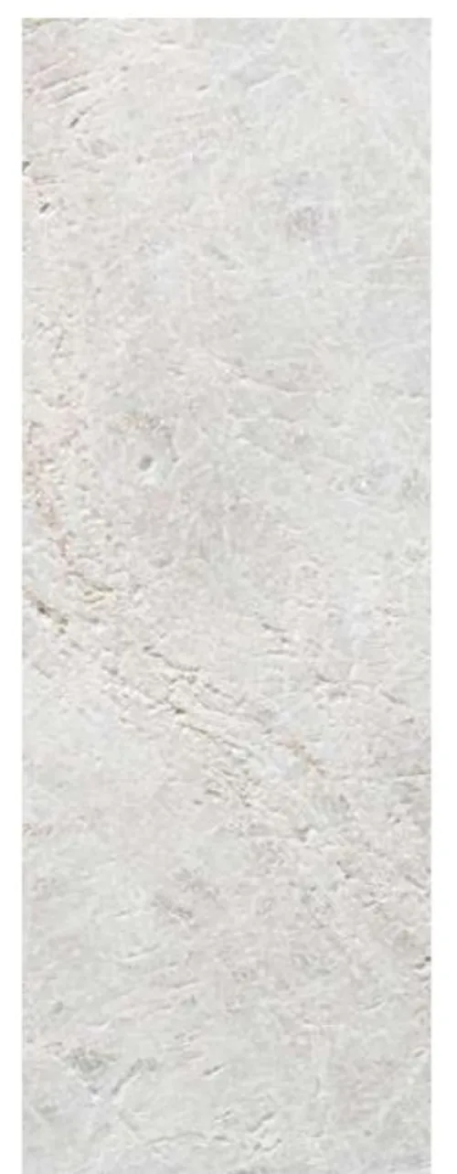 Sandblasted finish on Antolini stone — even matte abraded surface