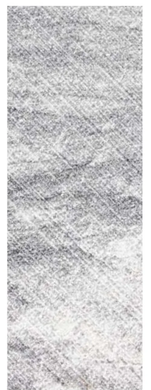 Stratos Oblique finish on Antolini White Super — diagonal sedimentary layers