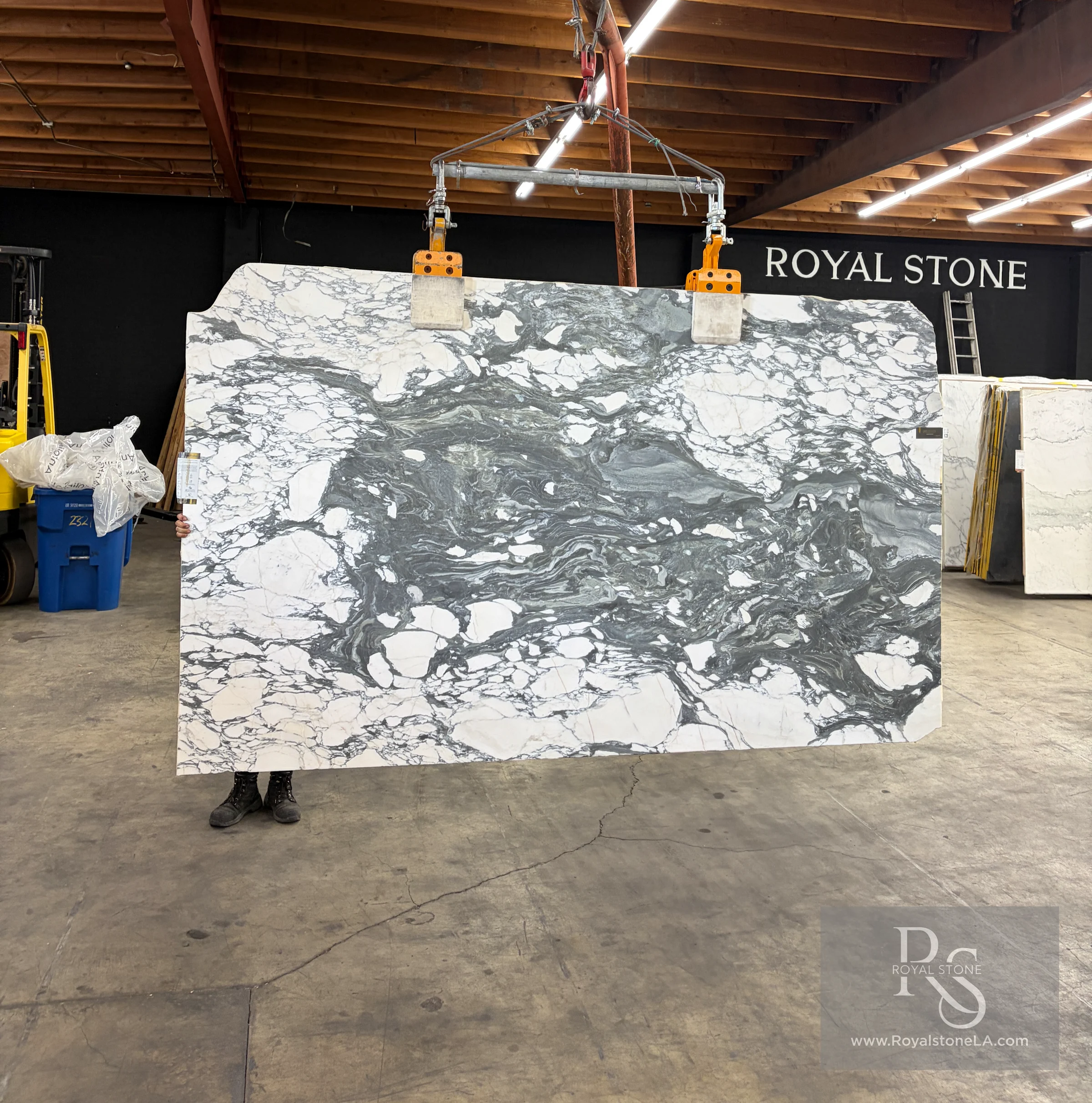 Additional view of the 2cm Antolini Arabescato Corchia Extra EC798 honed marble slab, 77 by 122 inches, being lifted at the Royal Stone yard with white and charcoal-gray veining