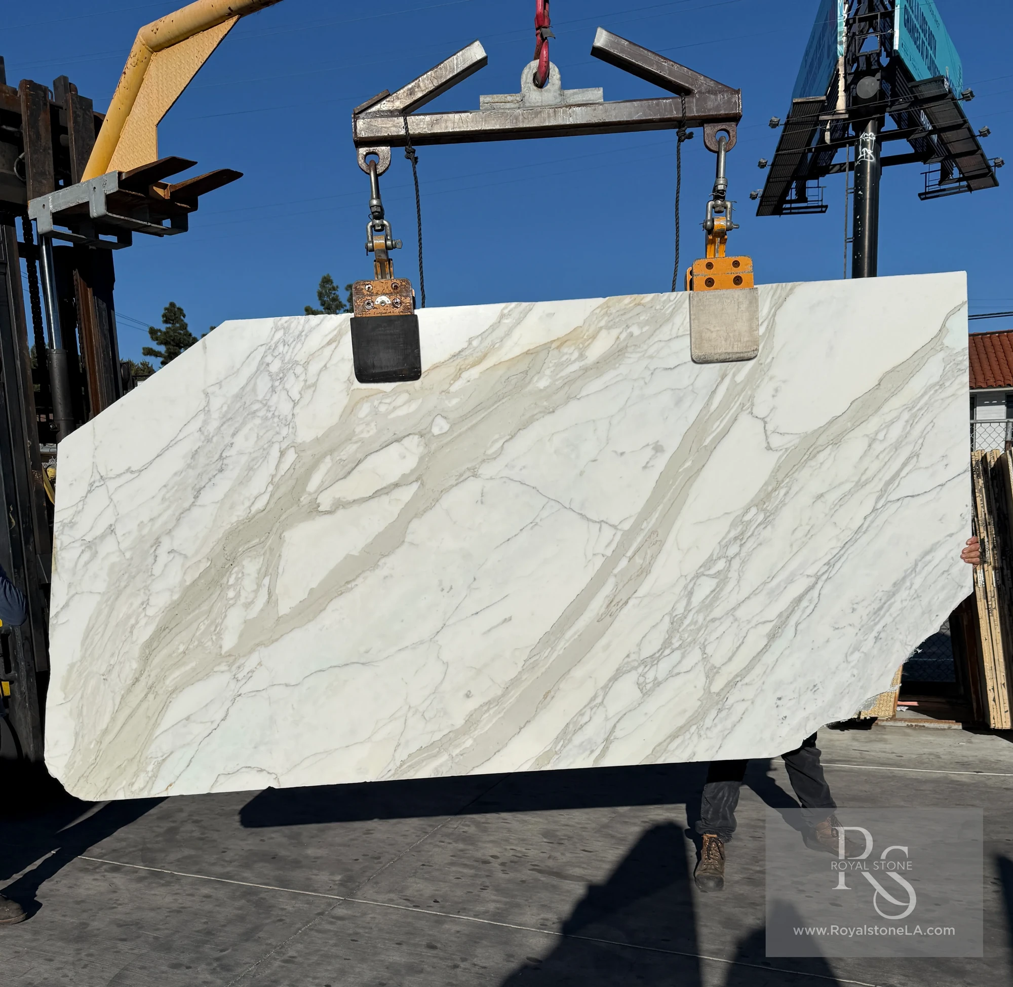 Antolini Calacatta Borghini YG576 marble slab with honed finish at Royal Stone Los Angeles, bright white field with soft grey-gold veining