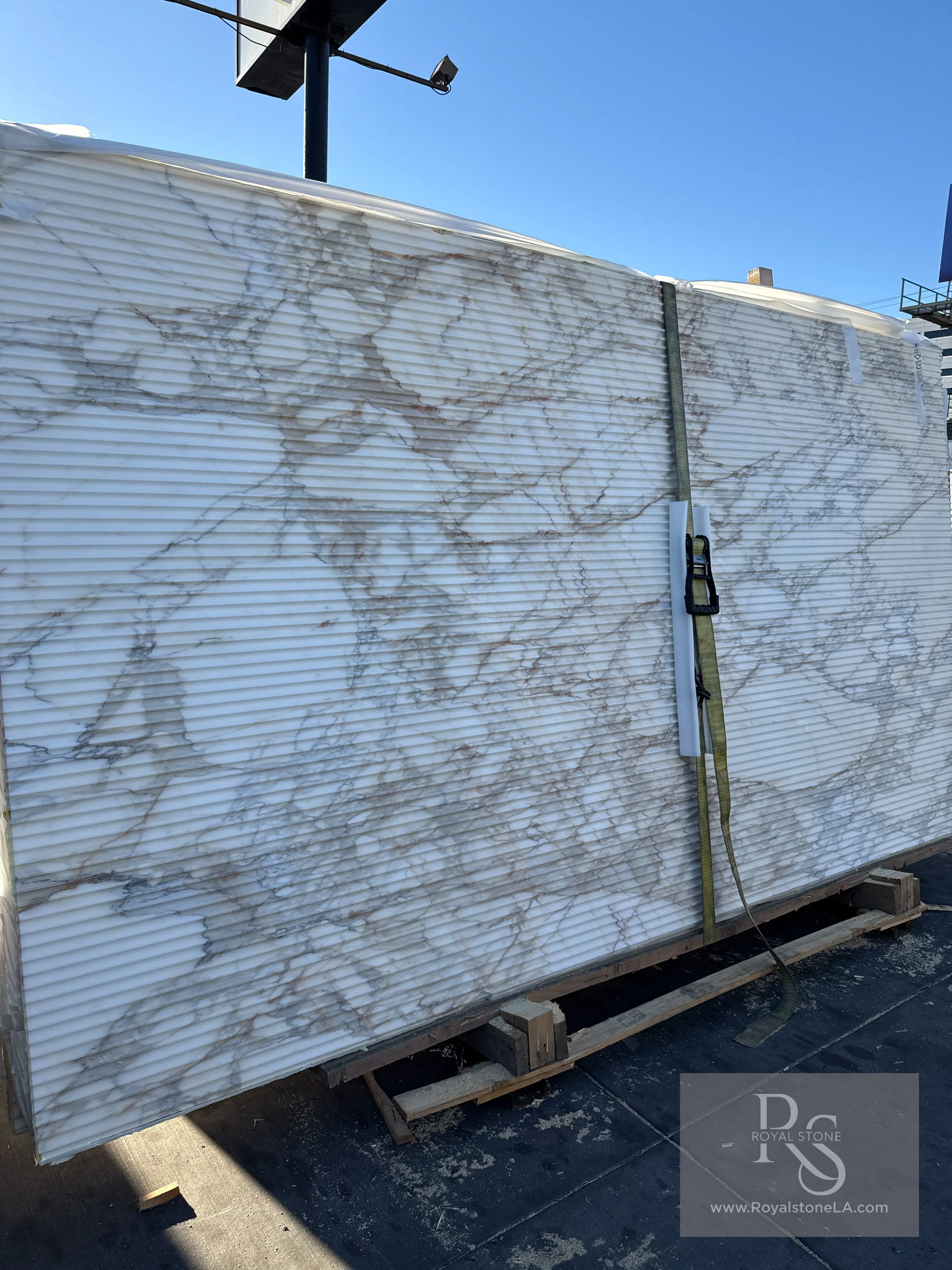 Antolini Calacatta Oro YG583 fluted marble slab at Royal Stone Los Angeles