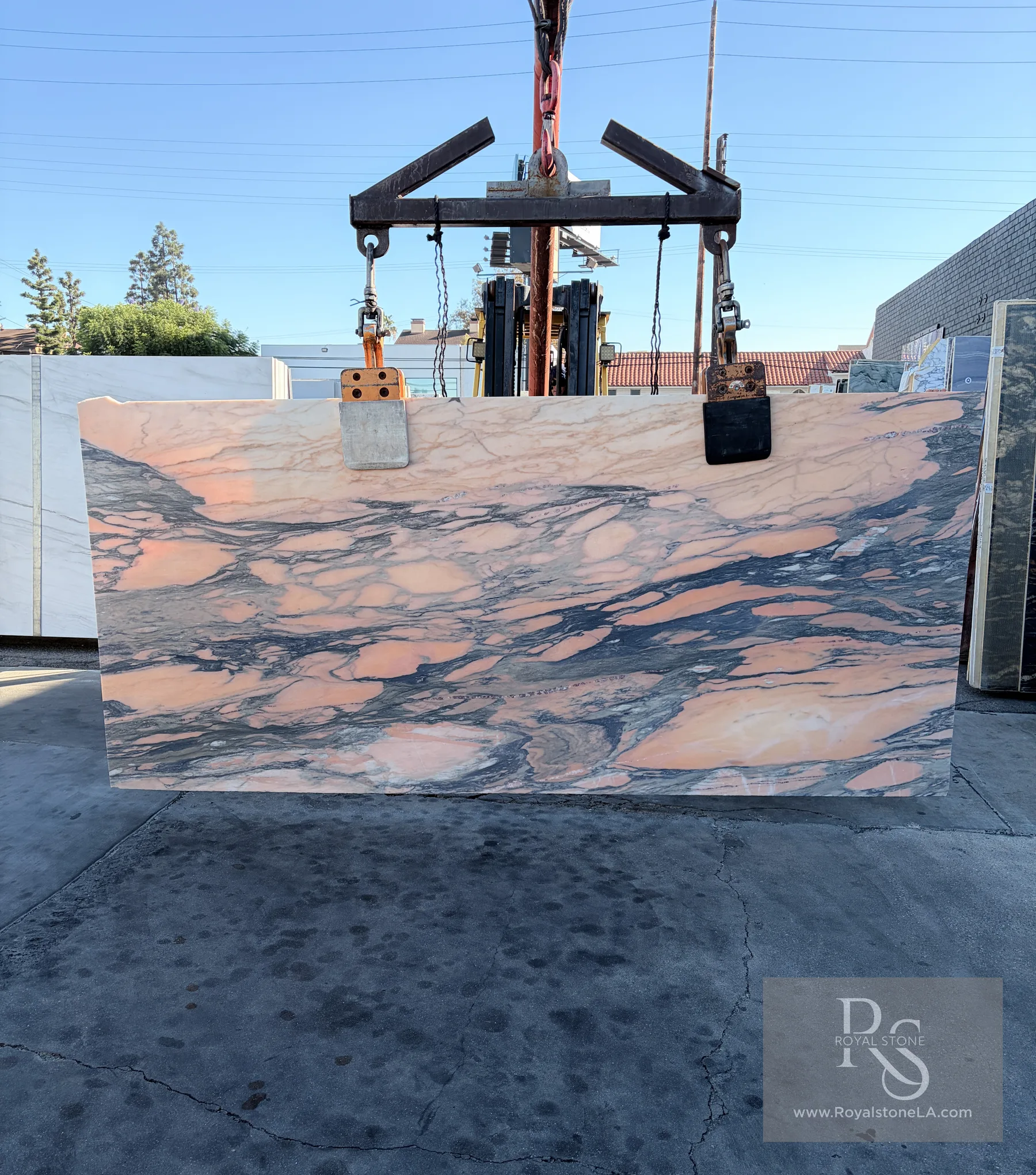 Antolini Calacatta Viola Rosenoir DX488 Paonazzo marble slab with honed finish, 53 x 115, at Royal Stone Los Angeles, peach-pink field with storm-gray and black veining