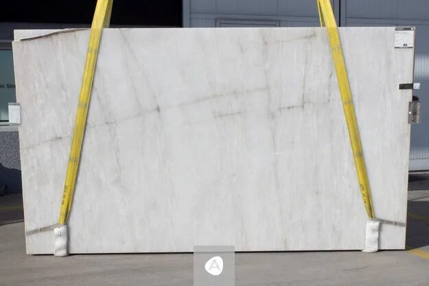 Antolini Cristallo Bianco Top quartzite slab with translucent white field and faint silver veining, polished