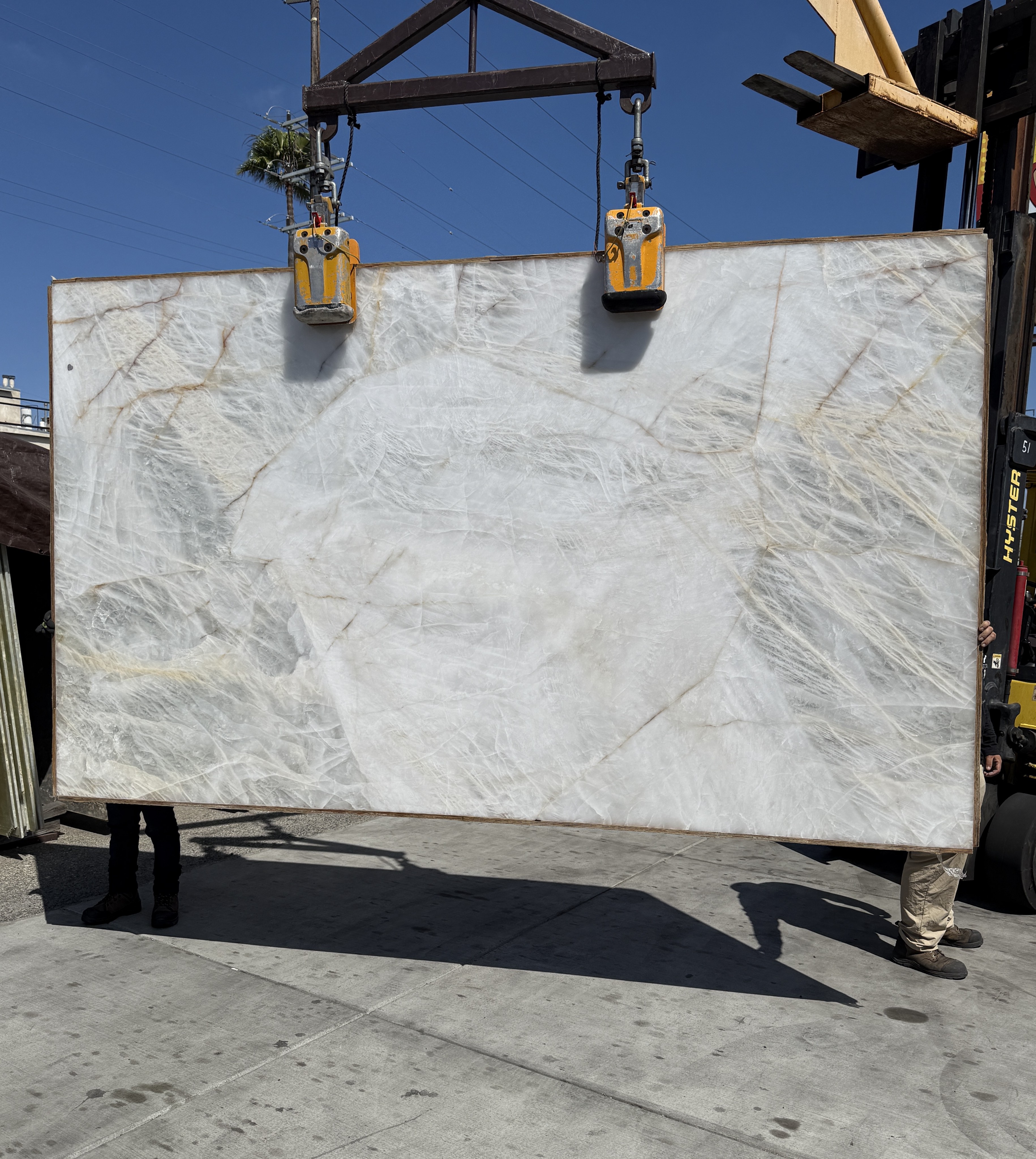 Antolini Cristallo Diamond Rutile Vitro Premium polished quartzite slab at Royal Stone, white-ice field with gold rutile needle inclusions