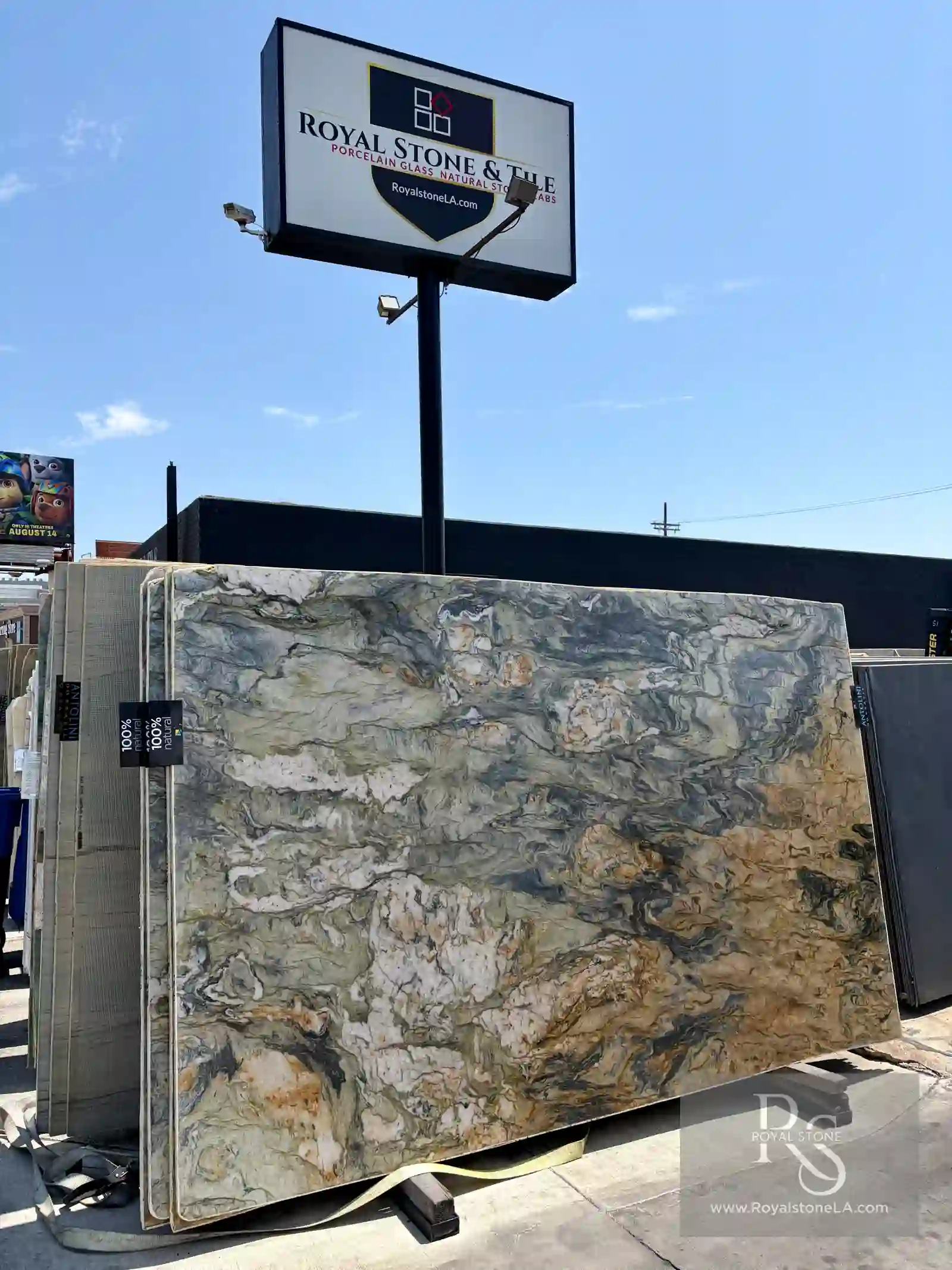 Antolini Fusion Wow Original quartzite slab, lot A2630, polished, standing in the Royal Stone Los Angeles yard — pale sage and silver-gray field with amber, bronze, and graphite currents
