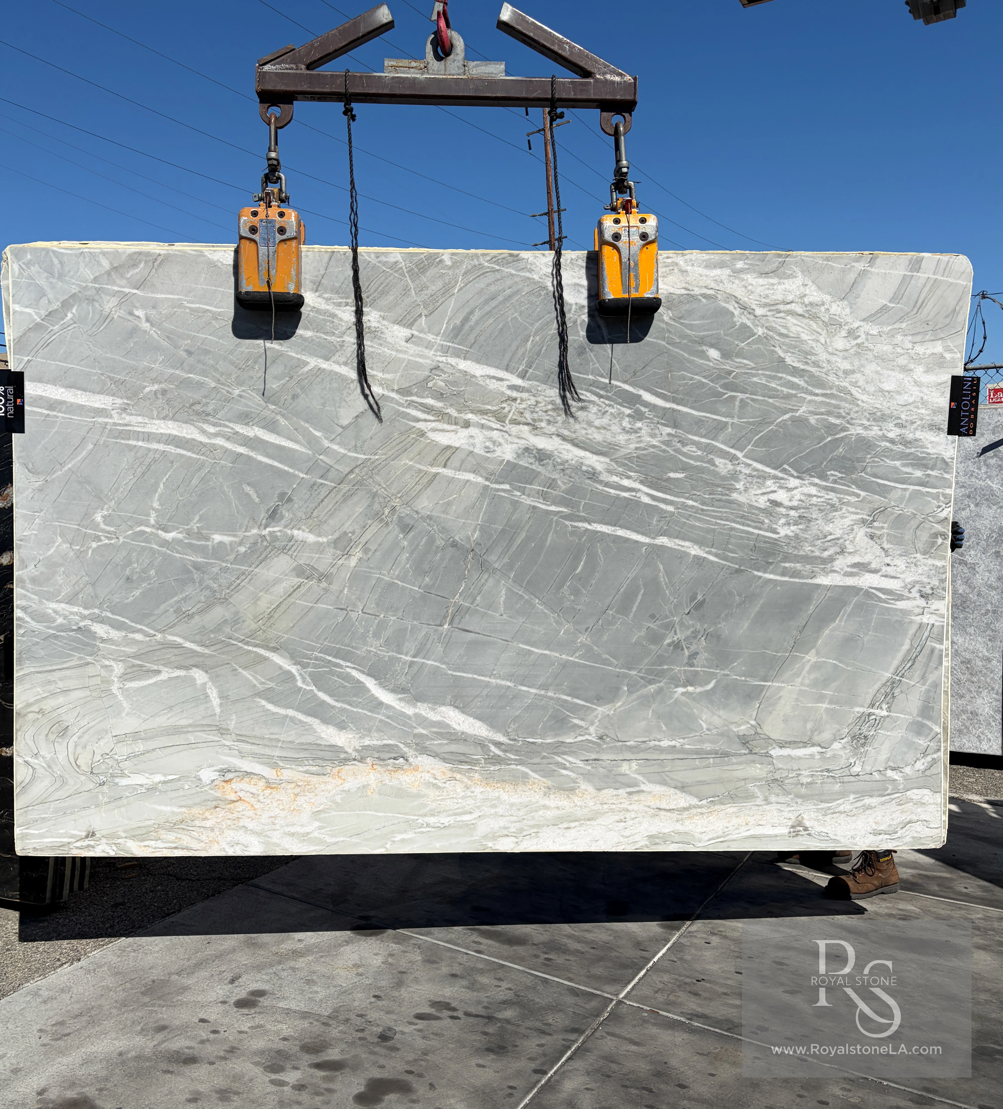 Antolini Quartzite Nuage Bianco AO893 honed slab at Royal Stone Los Angeles, soft cloud-white field with diffuse grey veining, 78 by 123 inches