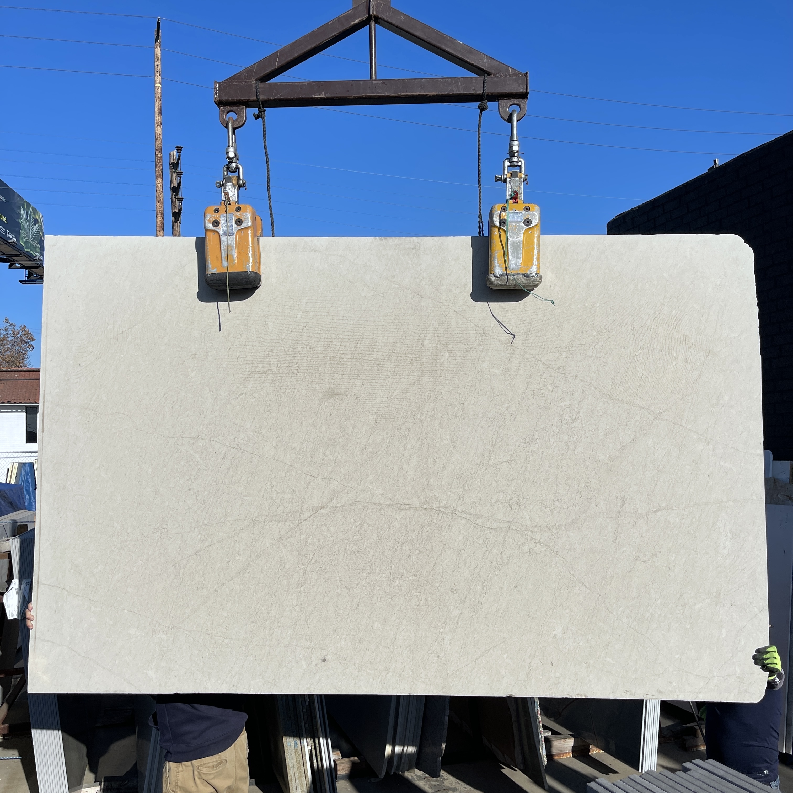 Antolini Taupe limestone honed slab at Royal Stone Los Angeles, near-uniform warm taupe body with faint hairline veining