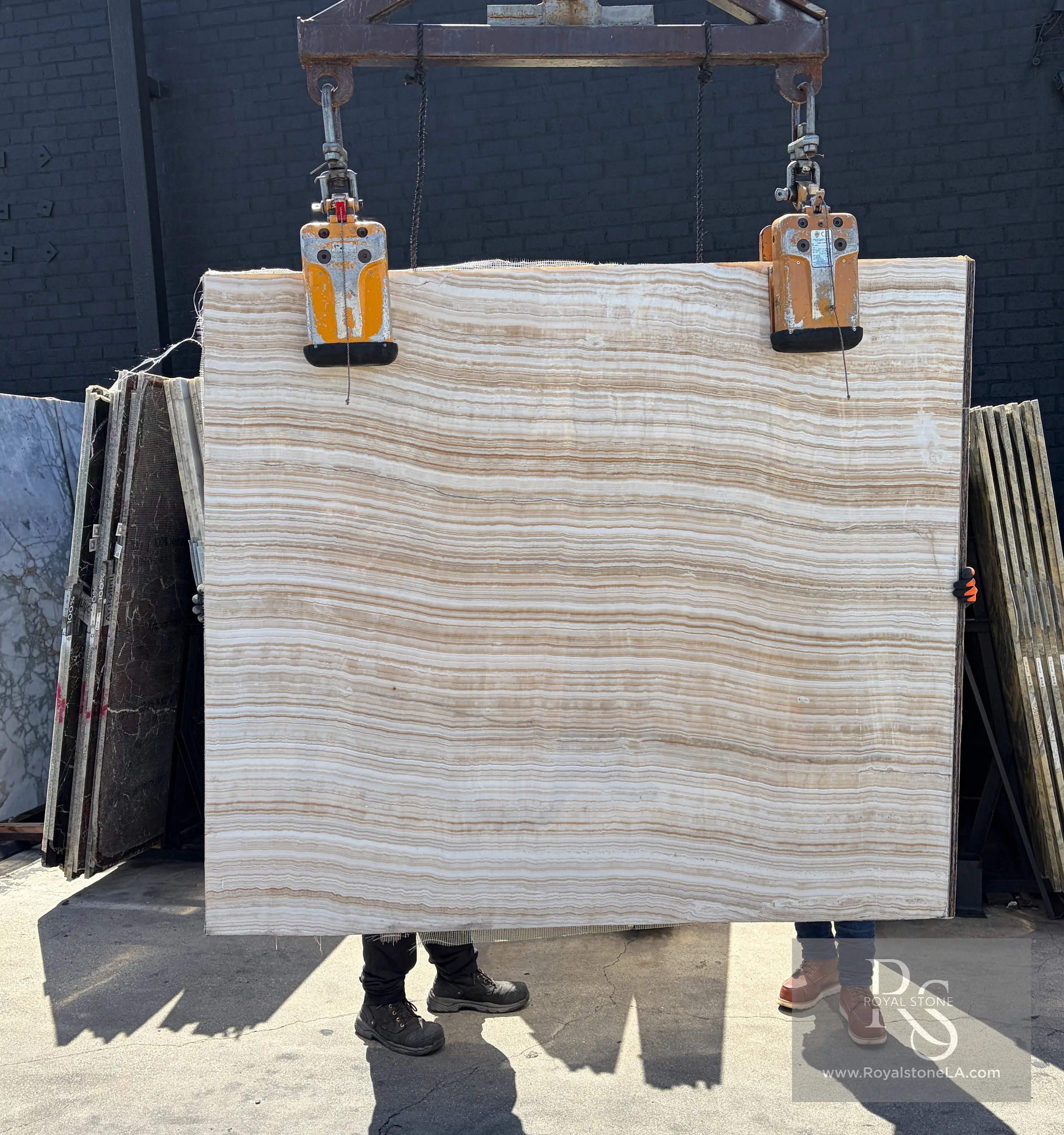 Bianco Ivory Linear Polished White Onyx slab at Royal Stone's expanded Los Angeles showroom
