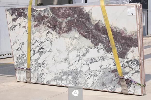 Breccia Capraia Wow marble slab with white ground broken by violet and burgundy breccia over grey veining, polished finish