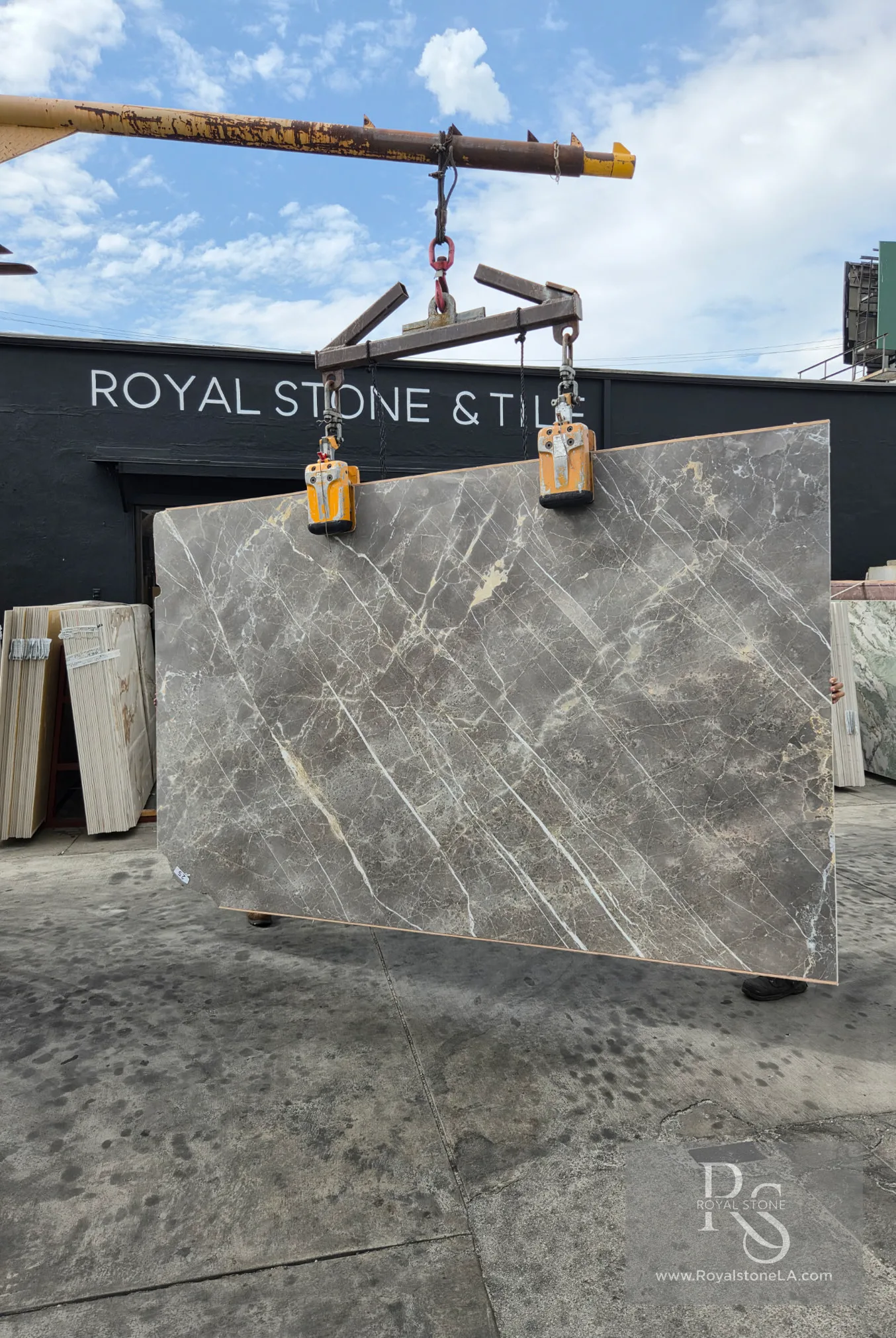 Grigio Collemandina marble slab from Lot 7846 in a warm taupe field, honed, 77 by 123 inches, at Royal Stone Los Angeles