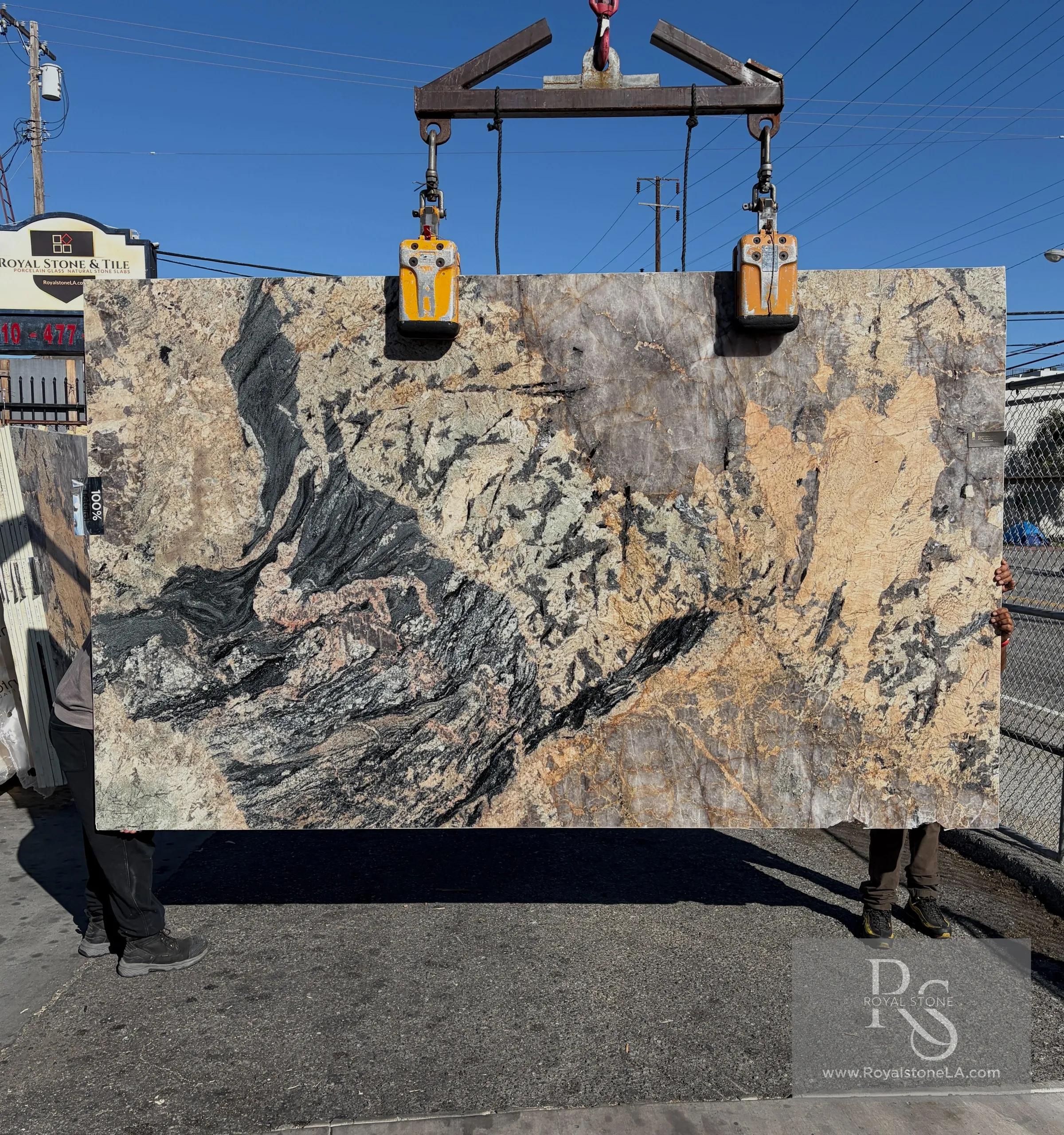 2cm Antolini Patagonia Tourmaline leathered quartzite slab with gold and charcoal mineral patterns