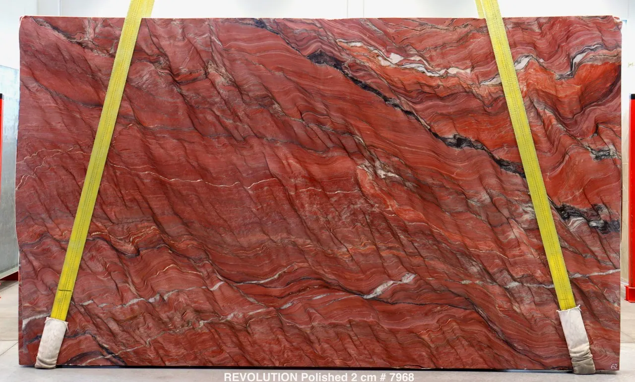 Revolution quartzite slab with brick-red field and dramatic diagonal banded movement, polished
