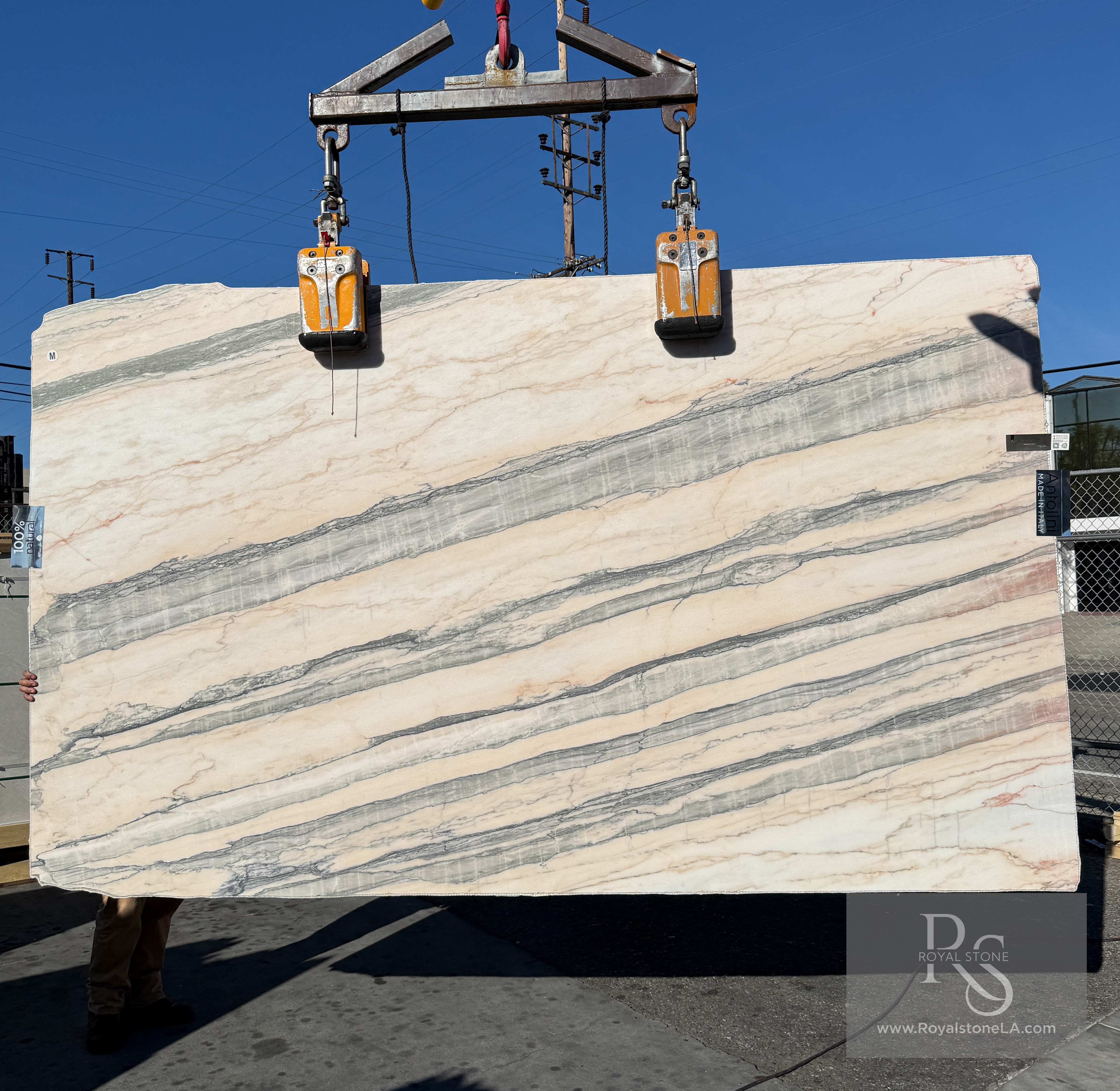 Antolini Rosa Aurora Estremoz Lineare Extra honed marble slab — peach field with horizontal grey banding, 76 by 126 inches