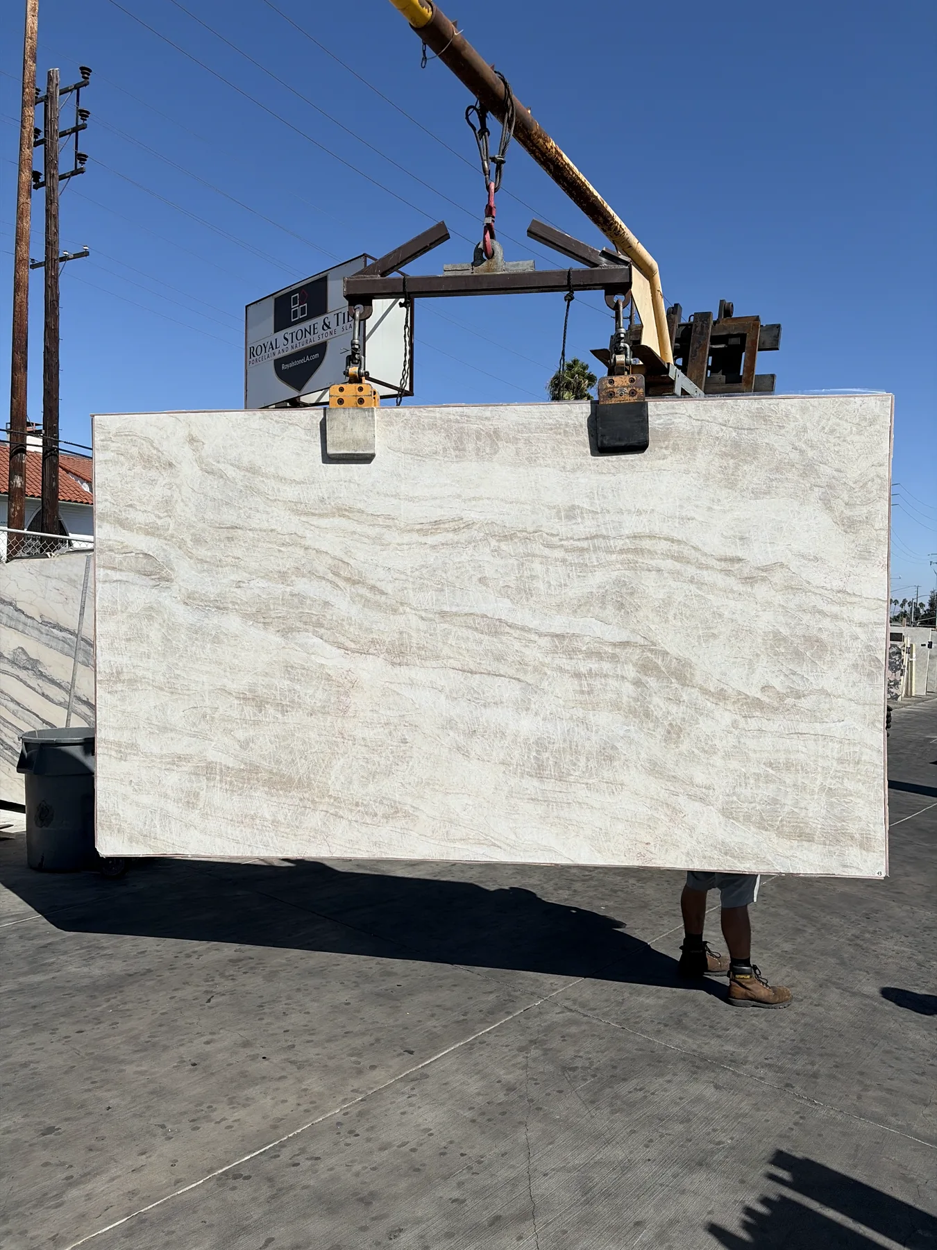 Taj Mahal Super Select Bassi 8831 honed quartzite slab standing in daylight at the Royal Stone yard in Los Angeles