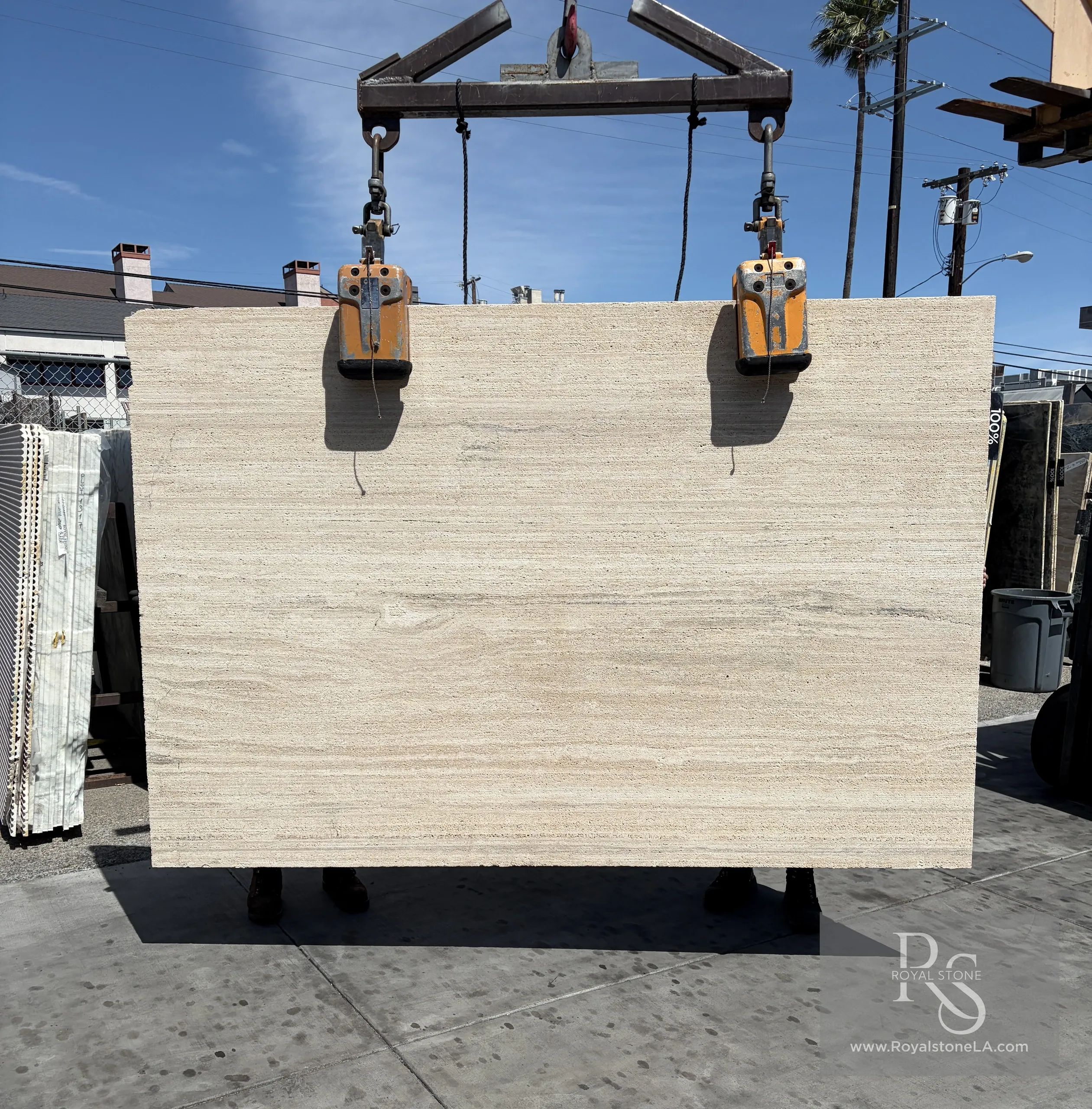 2cm Antolini Travertino Classico Light slab with Stratos finish, showing vein-cut pattern in ivory and cream tones