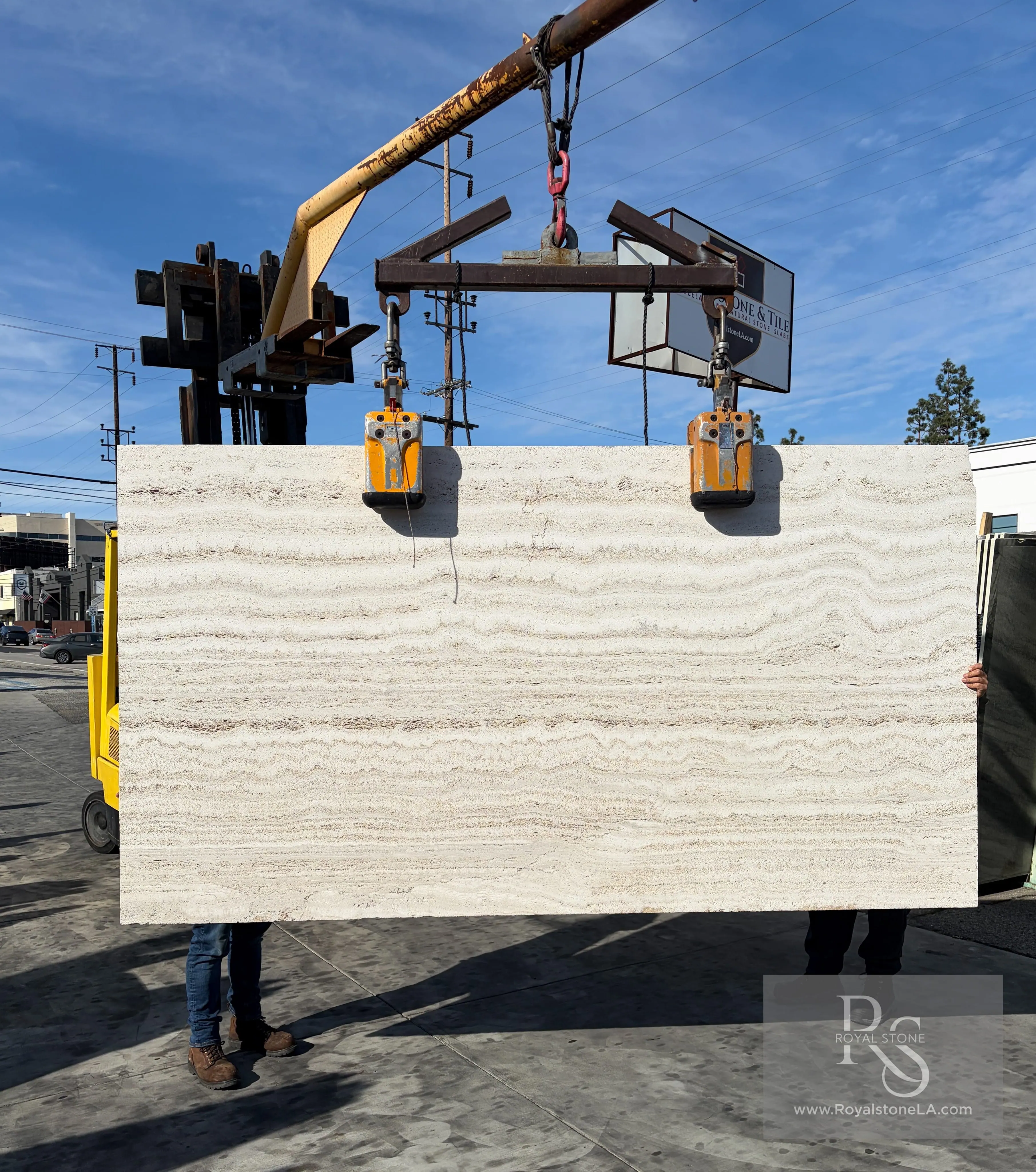 Travertino Cemento sandblasted vein-cut ivory travertine slab at Royal Stone Los Angeles
