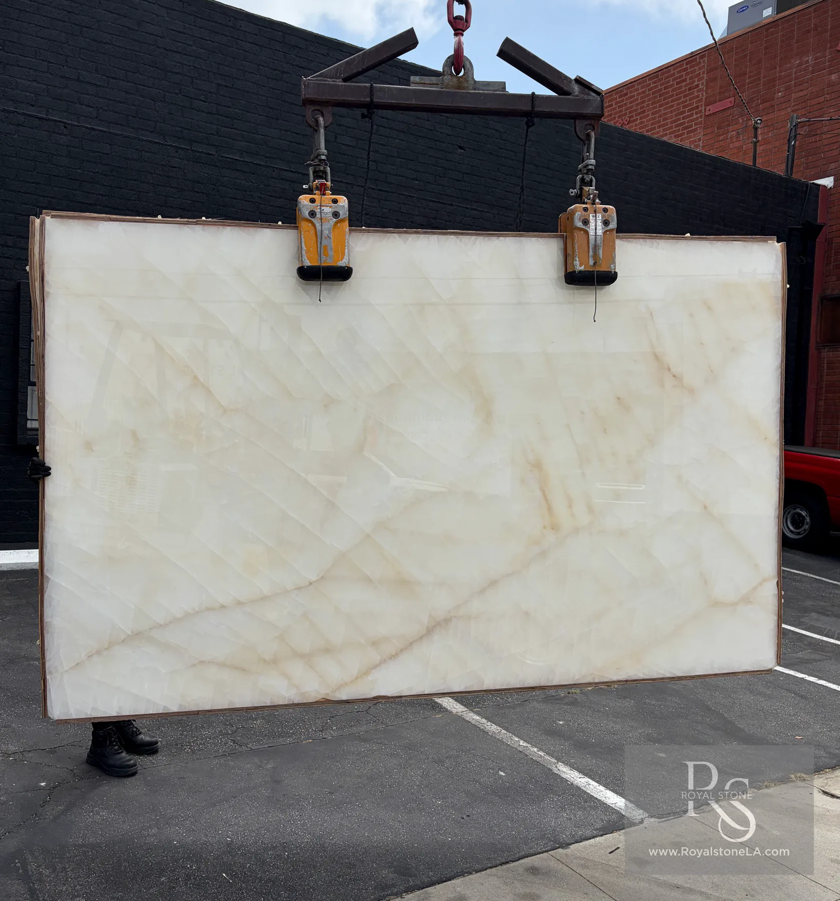 White Onyx Select Onice Bianco slab polished at 72 by 118 inches at Royal Stone Los Angeles, luminous ivory body with soft translucent banding