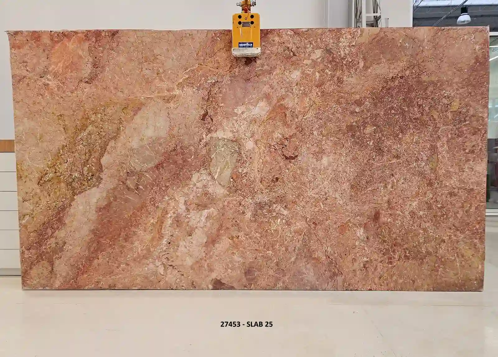 Breccia Pernice marble slab from lot 27453, with a warm rust, rose, and terracotta breccia field and pale cream fragments