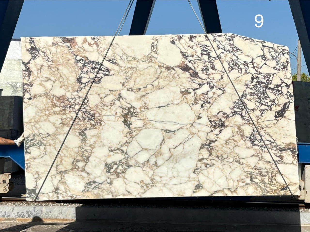 Calacatta Monet marble slab from lot 5203, 132 by 80 inches, photographed at the stone yard