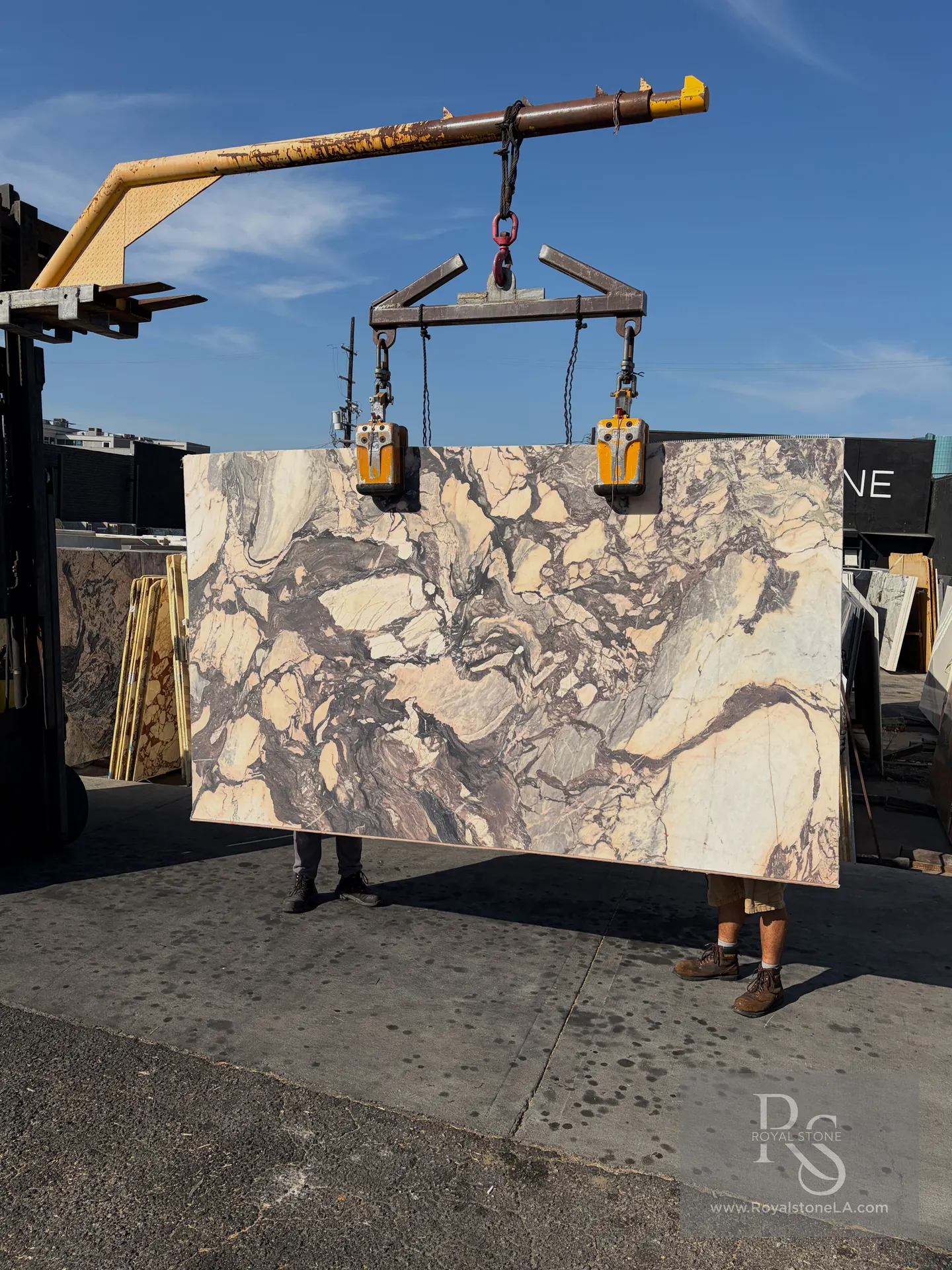 Calacatta Viola Nobile BAS8023 honed marble slab from Bassi Factory in Italy, 69 by 119 inches, with a warm ivory ground and gray-violet movement, at the Royal Stone yard in Los Angeles