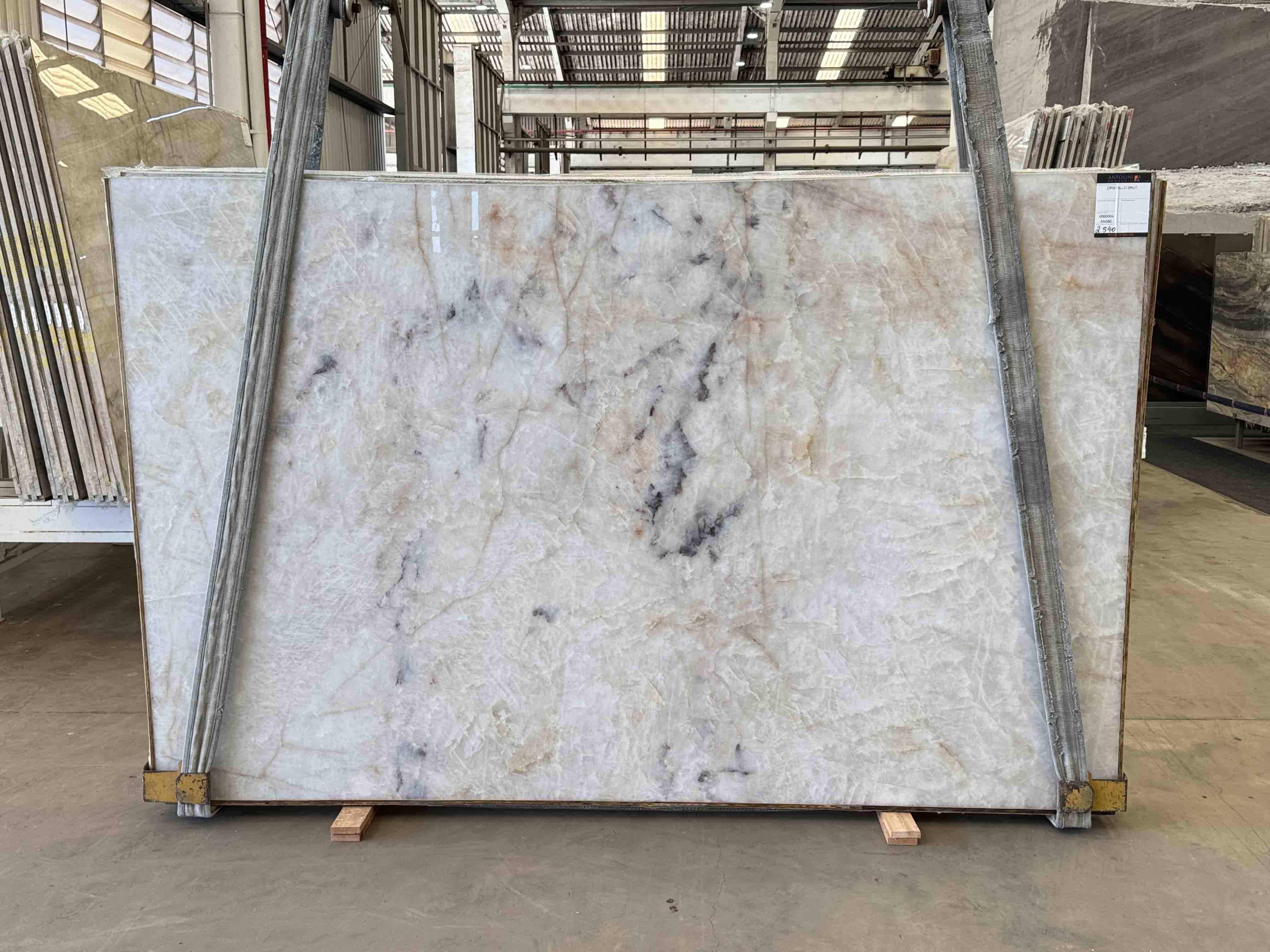 Antolini Cristallo Champagne quartzite slabs from Brazilian Block AN582, photographed at the stone yard