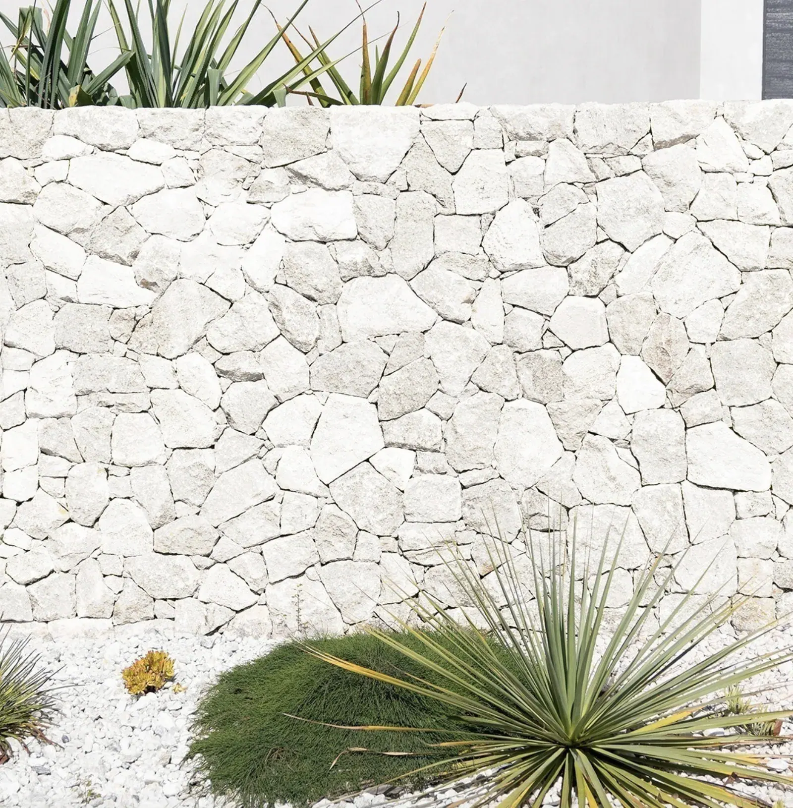 Lymra Limestone thin veneer installed as an exterior garden wall