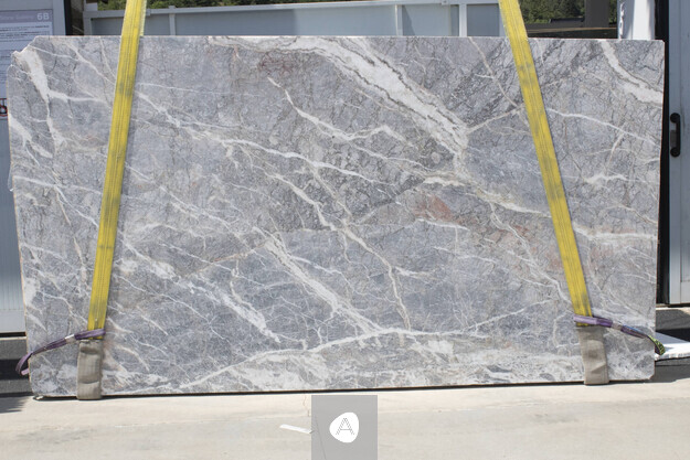 Fior di Pesco Carnico marble slab with cool gray-blue field and white and rose veining, matt finish