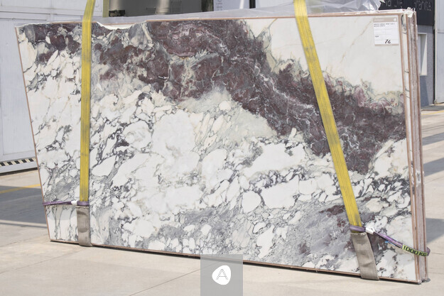 Breccia Capraia Wow marble slab with white ground broken by violet and burgundy breccia and gray veining, polished