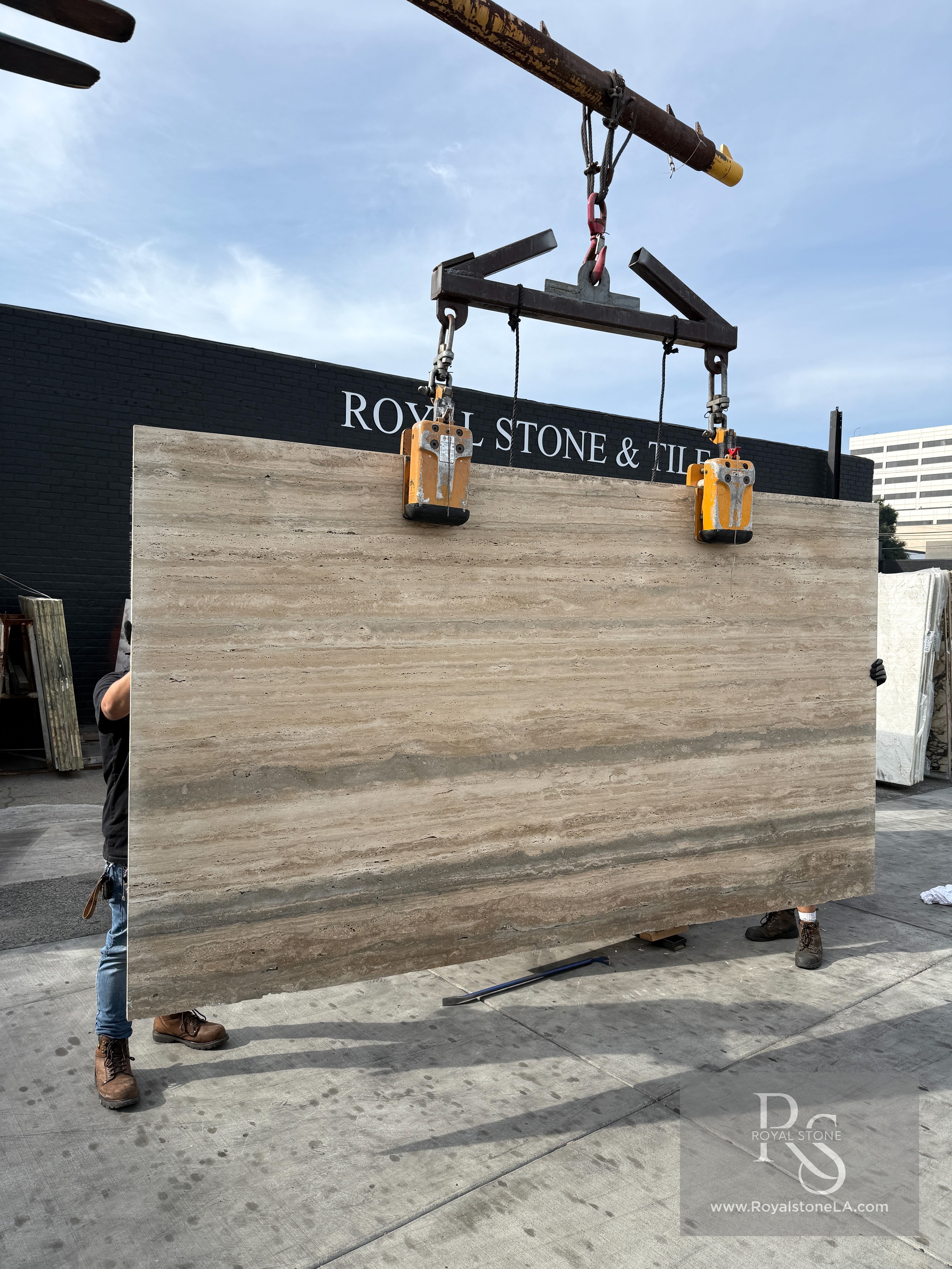 2cm Italian silver travertine unfilled vein-cut honed slab at Royal Stone Los Angeles