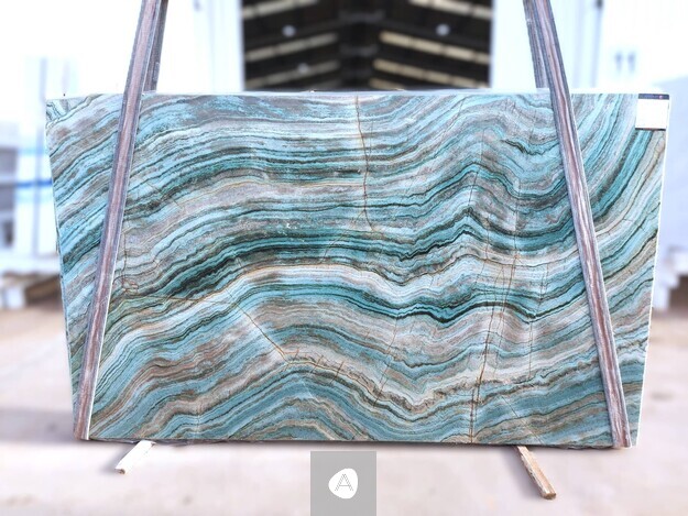 Antolini Fuxita Jade quartzite slab with banded turquoise-and-jade movement, polished