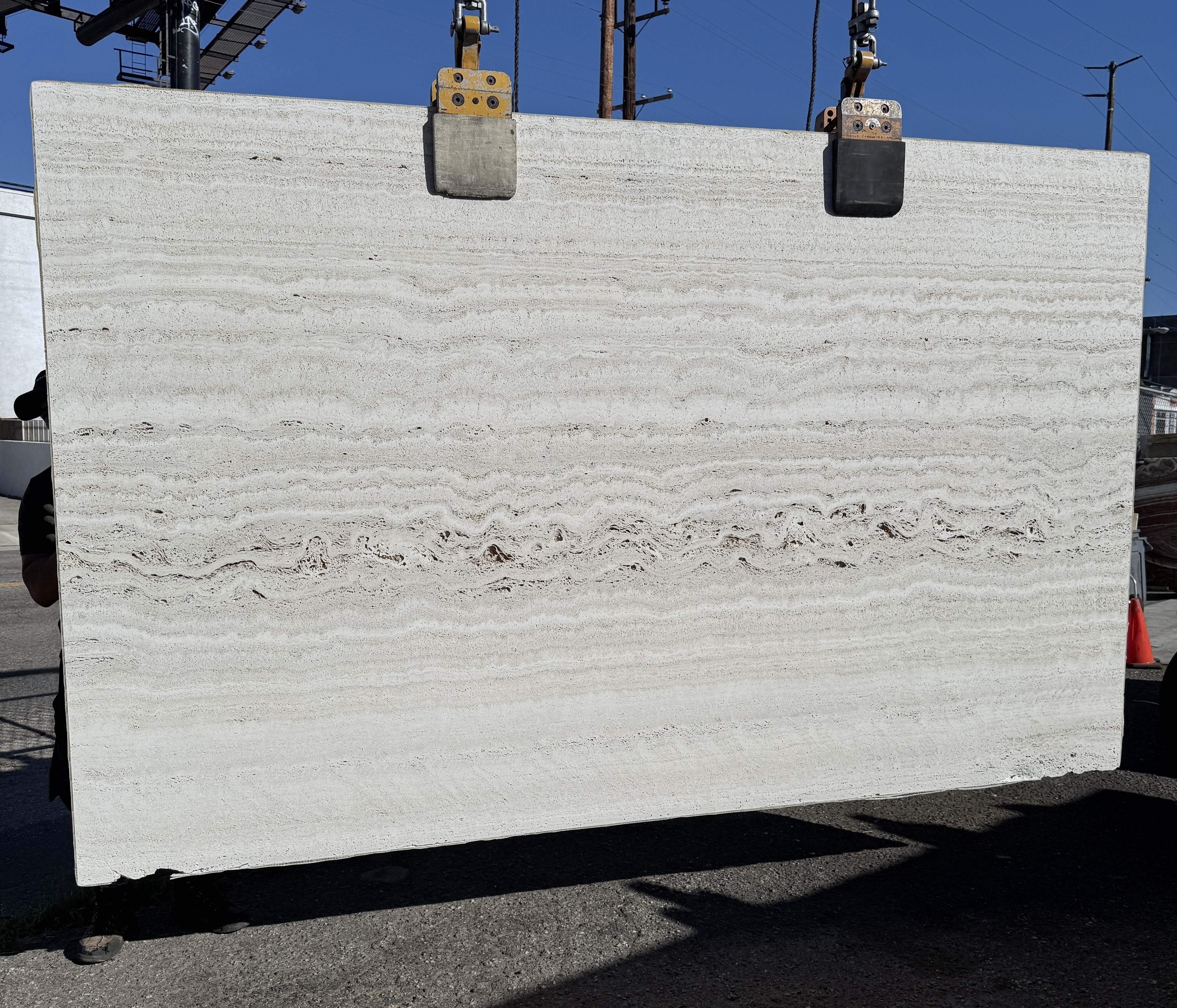 Henraux Italian travertine unfilled sandblasted vein-cut slab at Royal Stone Los Angeles