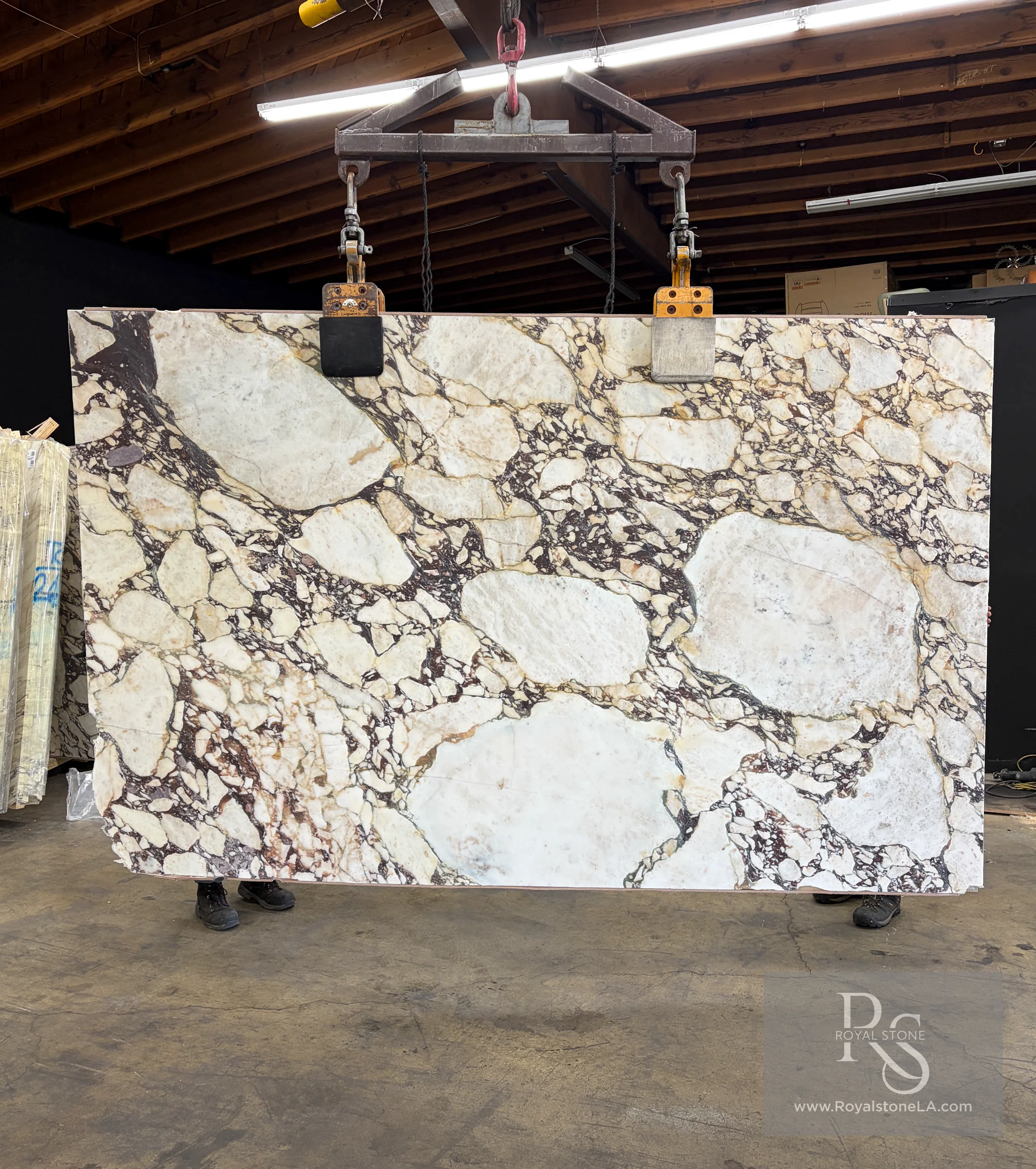Viola marble slab being lifted at the Royal Stone yard