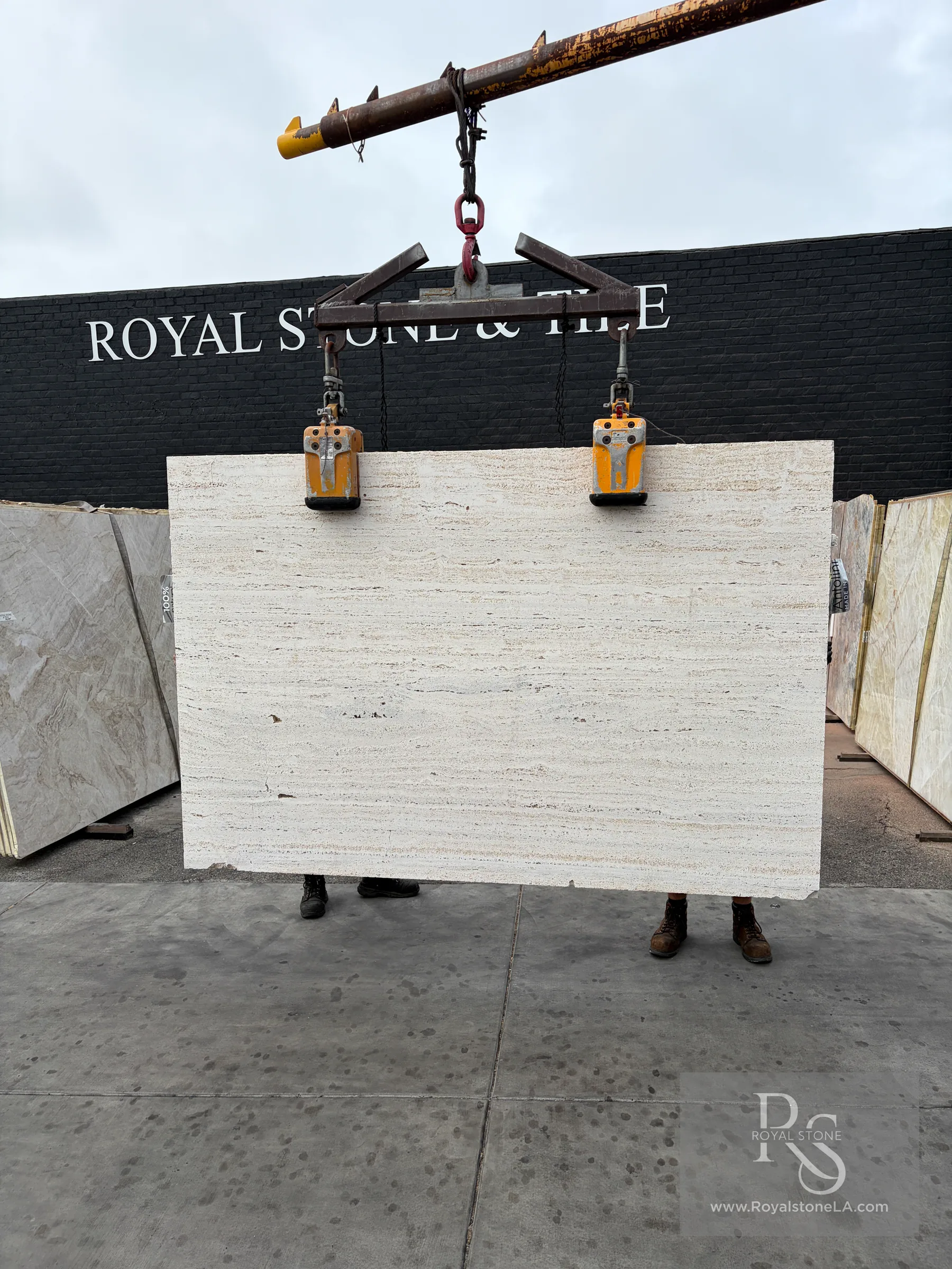 2cm Antolini Italian Travertine EE352 slab, vein cut and unfilled with Micro Sandblasted texture, 67 by 101 inches, at the Royal Stone yard in Los Angeles